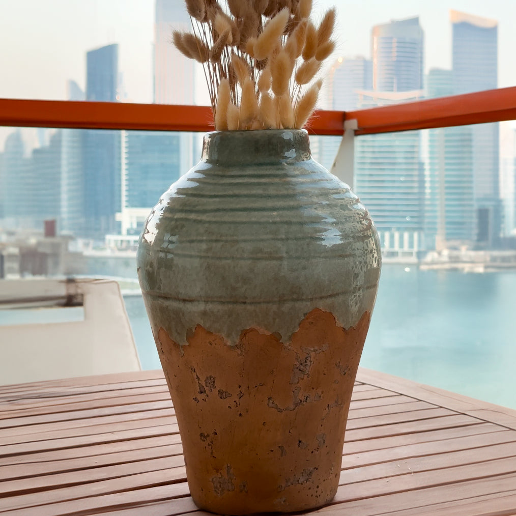 high end furniture dubai, clay vase