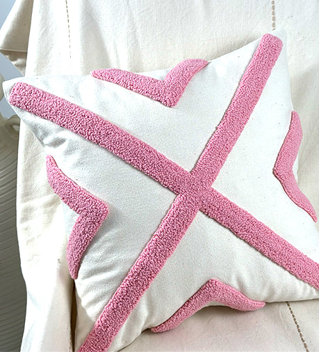 Plush hand-woven cushion featuring soft, textured fabric with intricate craftsmanship, adding warmth and elegance to any space.