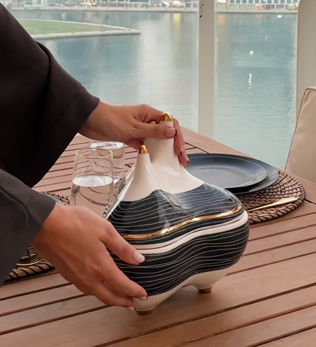 Powell Decorative Bowl with a sleek, modern design and refined finish, perfect for adding a stylish accent to any space.