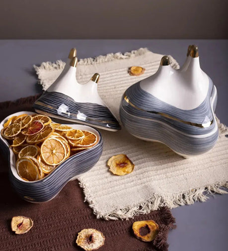 Powell Decorative Bowl with a sleek, modern design and refined finish, perfect for adding a stylish accent to any space.