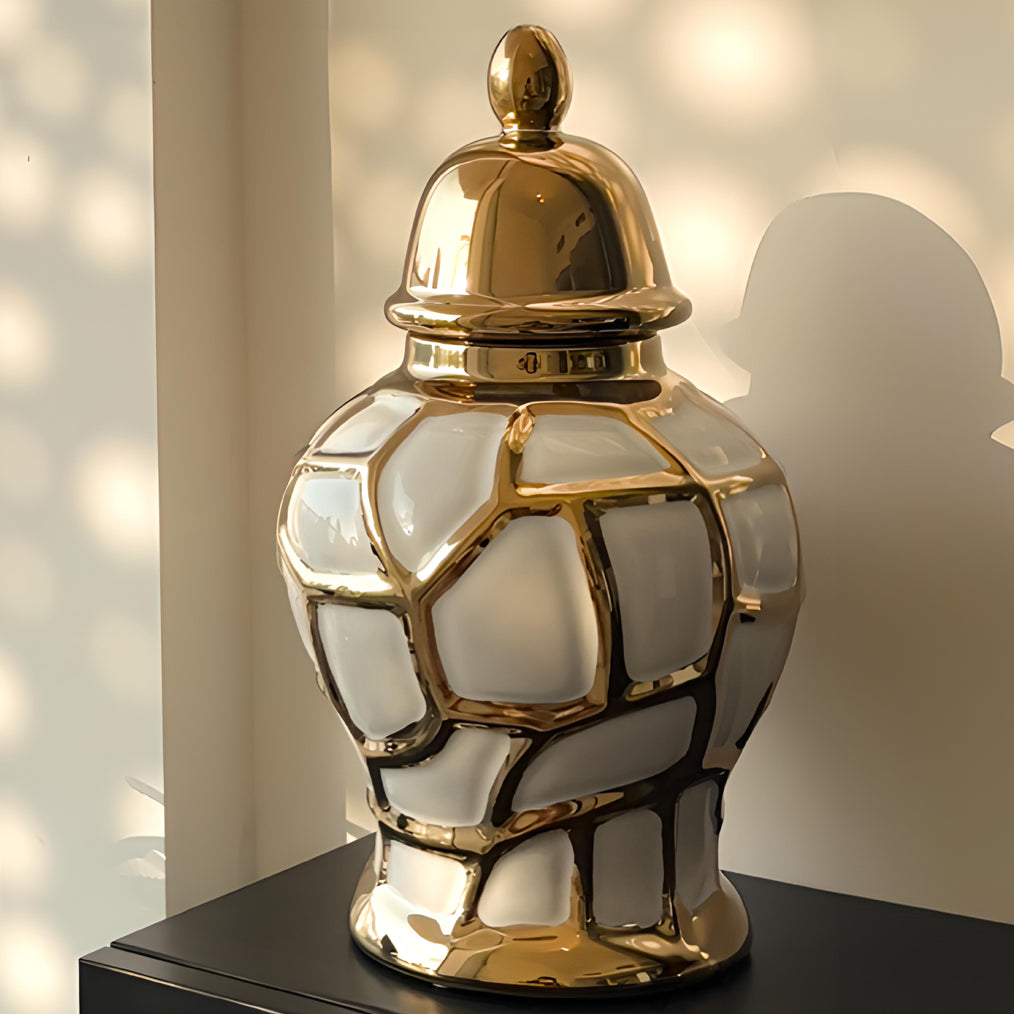 Noor decorative urn with a sleek, elegant design, featuring intricate detailing and a glossy finish, ideal for enhancing the aesthetic of any room.